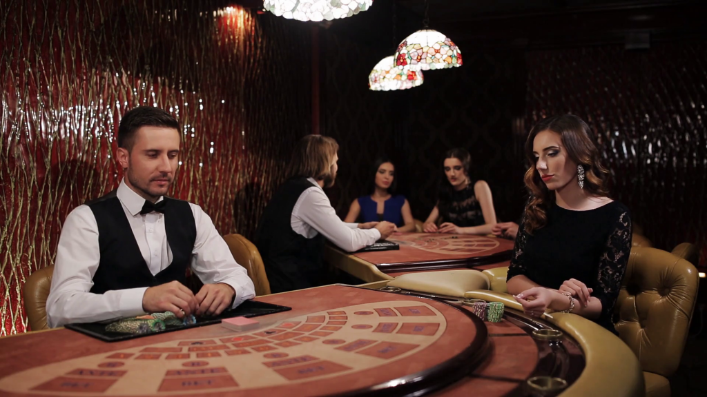 elegant-luxury-girl-in-black-dress-playing-blackjack-in-casino_b2rgfjs__thumbnail-1080_01